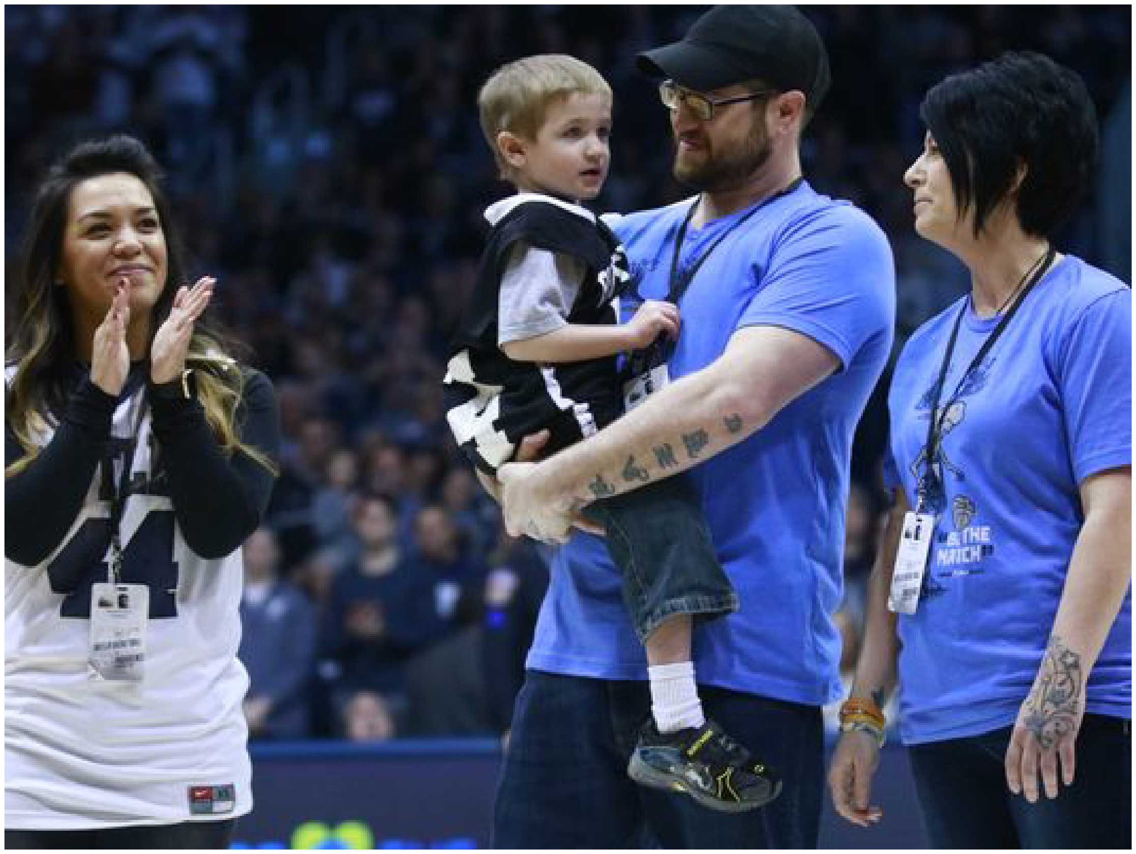 Samantha Smith, Deegan Scott, and Chase Stigall at the halftime of the Big East basketball game.
